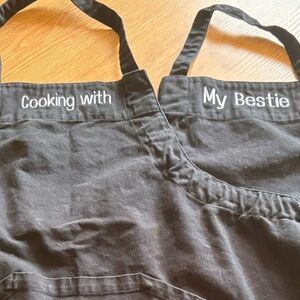Black Aprons with Embroidered Text